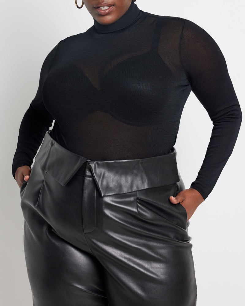 Front of a model wearing a size 14/16 Moira Sheer Turtleneck in Totally Black by ELOQUII. | dia_product_style_image_id:236540